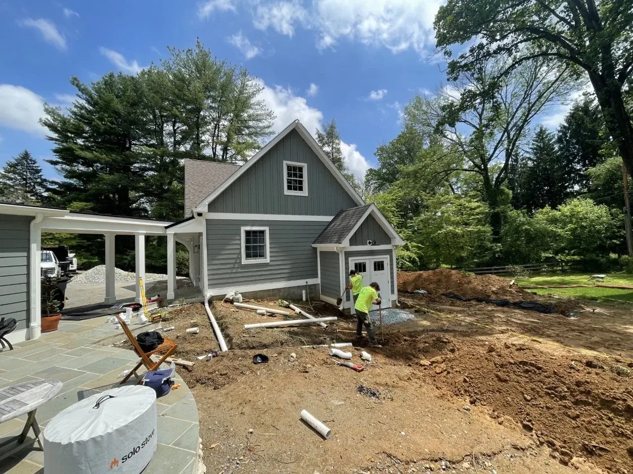 Site prepared beside a house for a new build-out